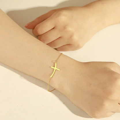 Simple Cross Bend Bracelet in stainless steel with adjustable chain and cross pendant