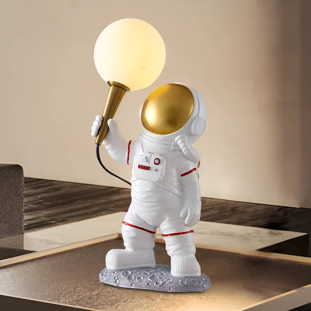 White astronaut figure children's desk lamp and night light in seated, standing, or wall lamp styles.