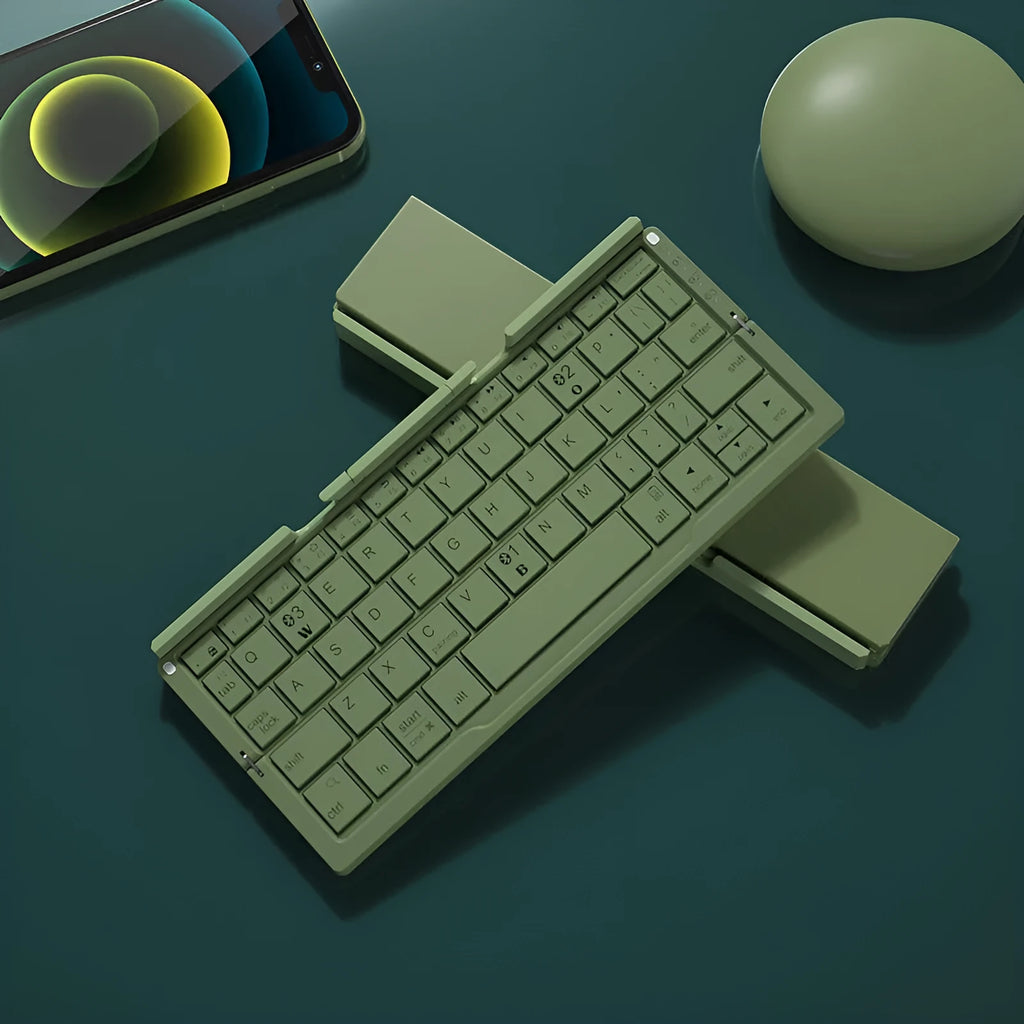 Silver white folding Bluetooth keyboard with integrated stand holding tablet at angle