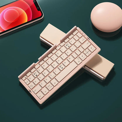 Compact folding Bluetooth keyboard with built-in stand for phones and tablets