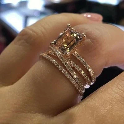 Rose gold cubic zirconia wedding ring with geometric design, perfect for brides and engagements