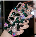 Clear rhinestone decorative iPhone case showing TPU construction with crystal gem elements