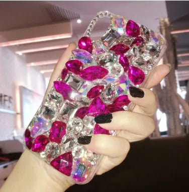 Clear rhinestone decorative iPhone case showing TPU construction with crystal gem elements