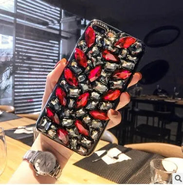 Clear rhinestone decorative iPhone case showing TPU construction with crystal gem elements