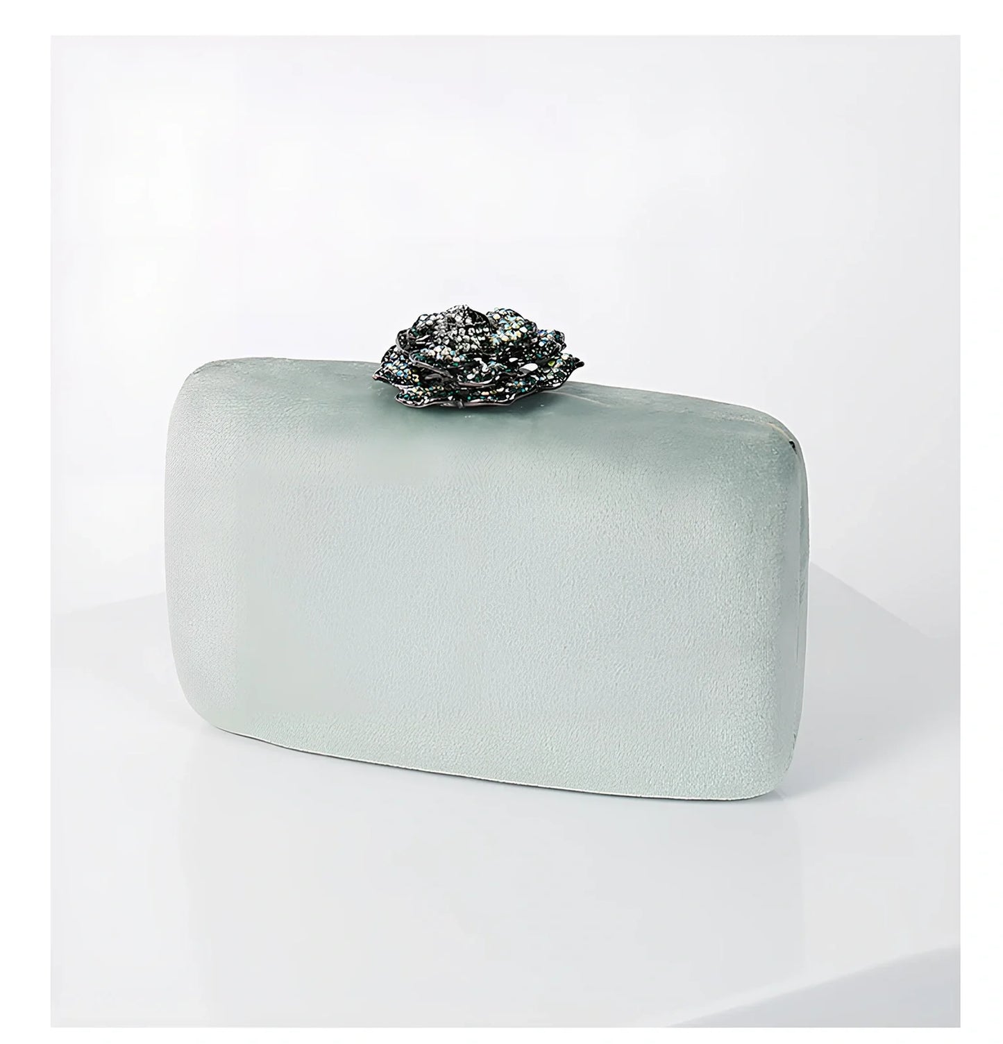 Suede diamond evening clutch bag in black with 17.5cm width, chain strap, and compact 13.8x5cm design for parties