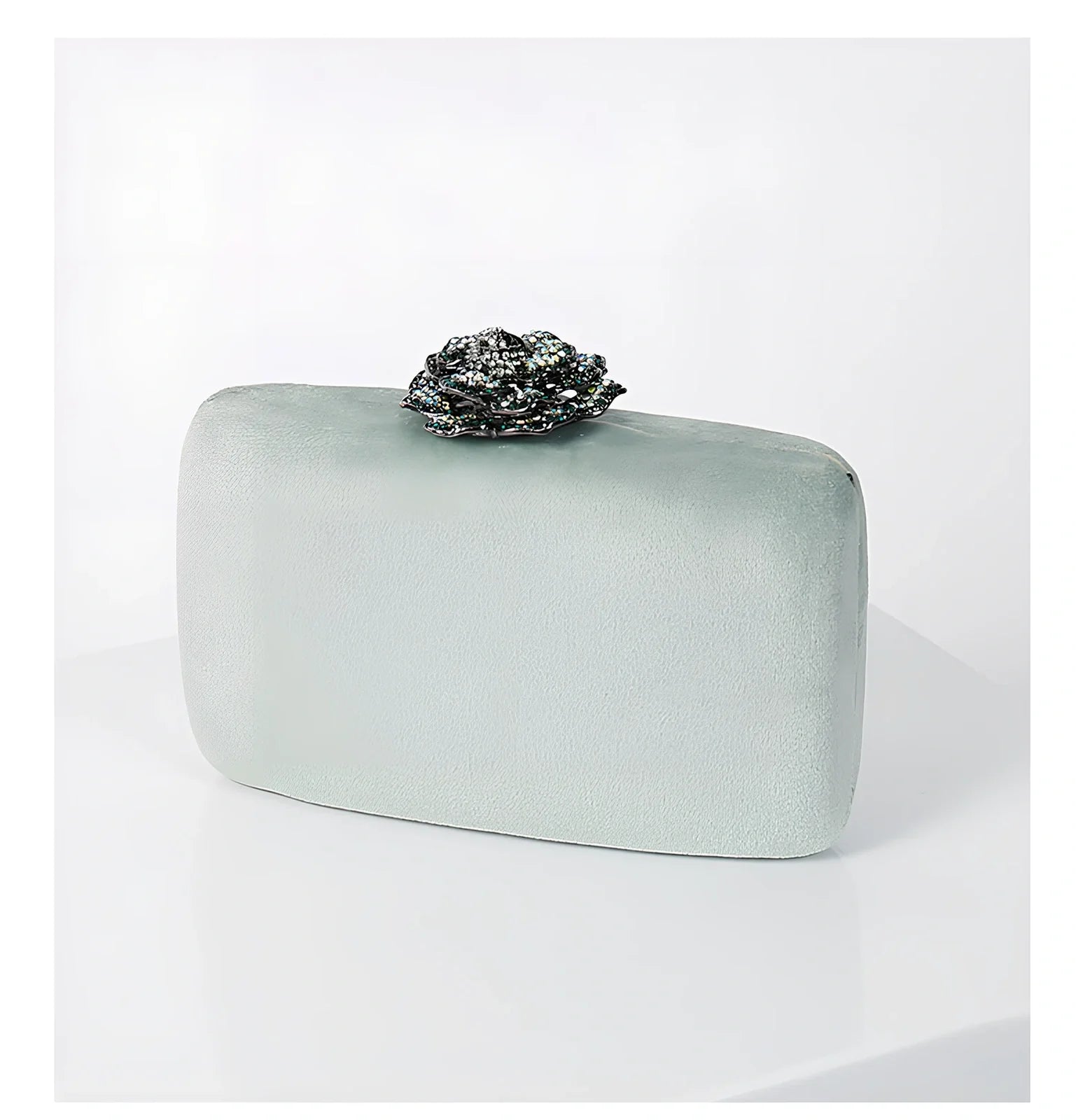Suede diamond evening clutch bag in black with 17.5cm width, chain strap, and compact 13.8x5cm design for parties