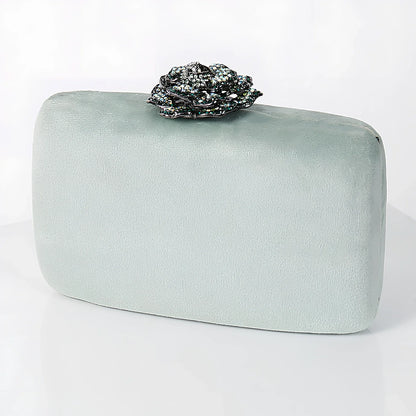 Suede diamond evening clutch bag in black with 17.5cm width, chain strap, and compact 13.8x5cm design for parties