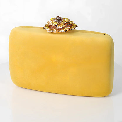 Suede diamond evening clutch bag in black with 17.5cm width, chain strap, and compact 13.8x5cm design for parties