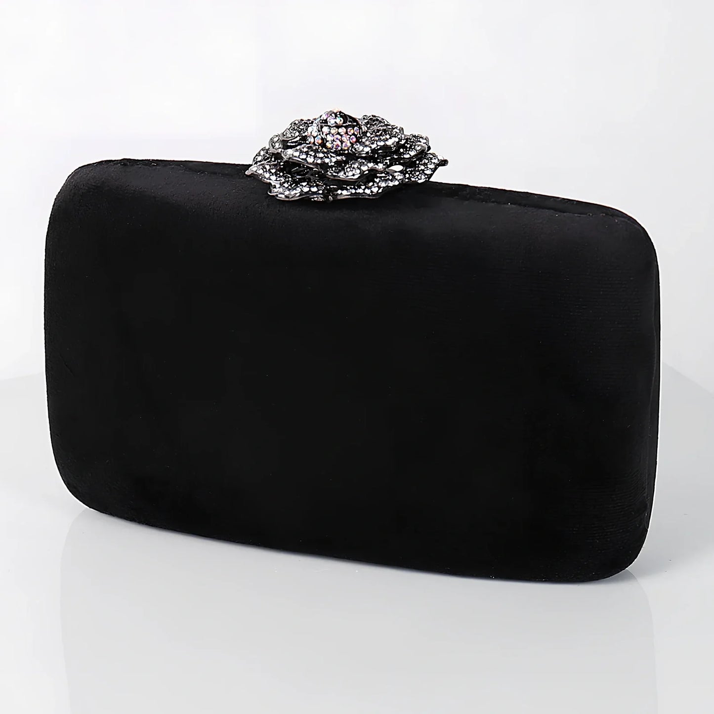 Suede diamond evening clutch bag in black with 17.5cm width, chain strap, and compact 13.8x5cm design for parties
