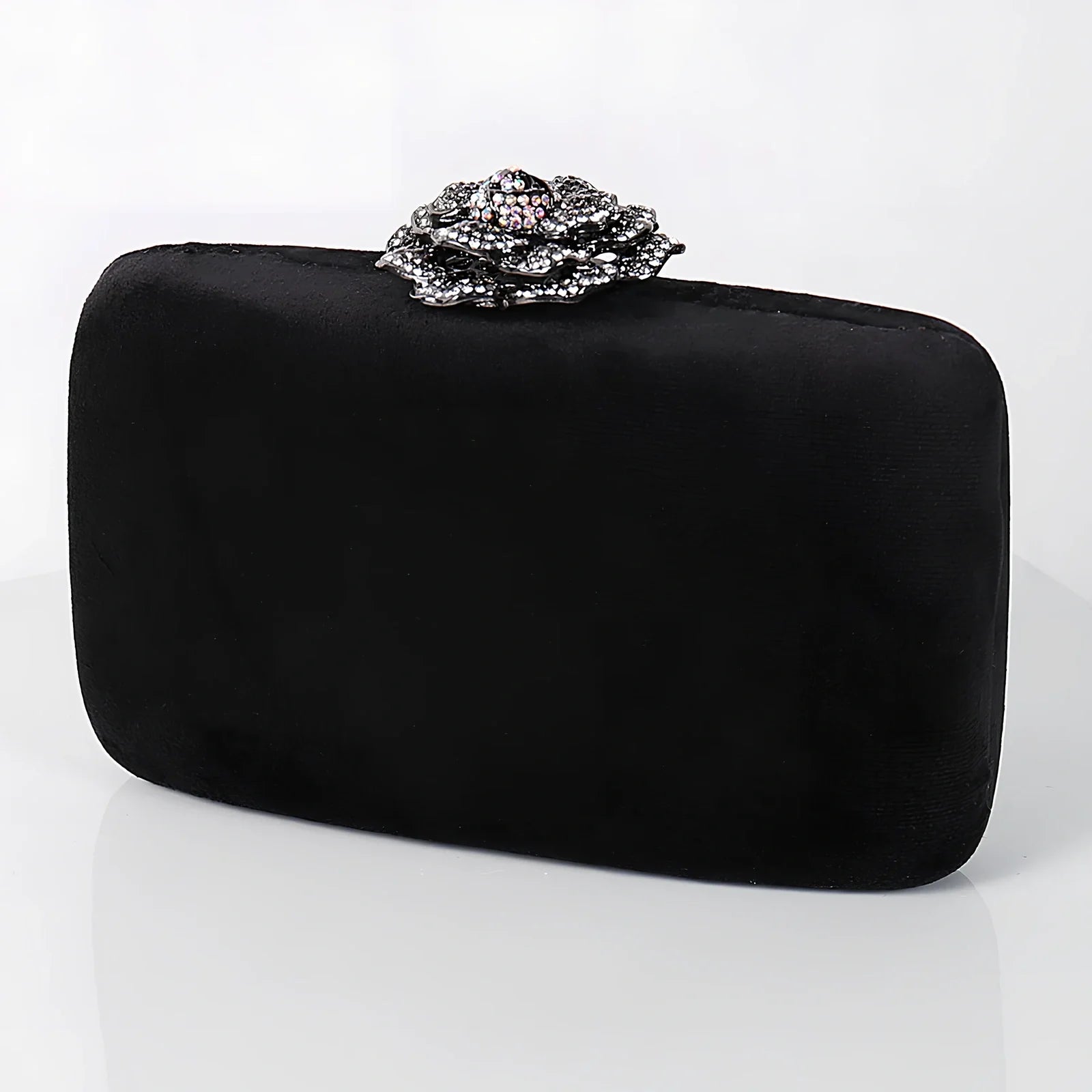 Suede diamond evening clutch bag in black with 17.5cm width, chain strap, and compact 13.8x5cm design for parties