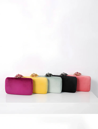 Suede diamond evening clutch bag in black with 17.5cm width, chain strap, and compact 13.8x5cm design for parties