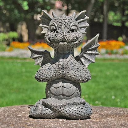 Small dinosaur meditation ornament for garden decor, made of durable resin with protective coating