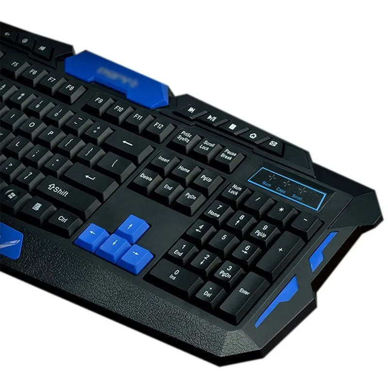 Blue and black wireless keyboard and mouse set on a desk, showing the low-profile keyboard and ergonomic mouse.