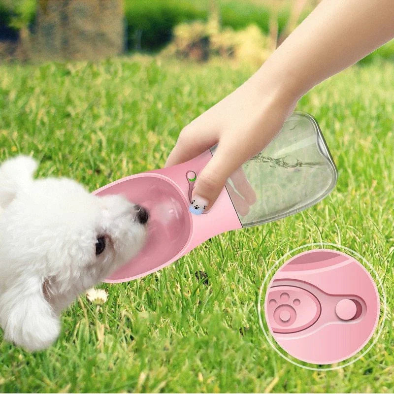 Portable Outdoor Pet Water Bottle with one-touch waterproof button, made of durable food-grade plastic for hydrating pets on the go