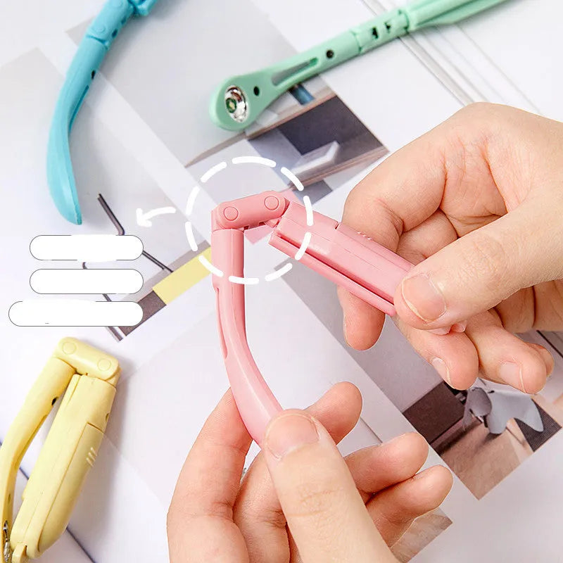 Yellow foldable USB rechargeable book light showing reading and night light modes