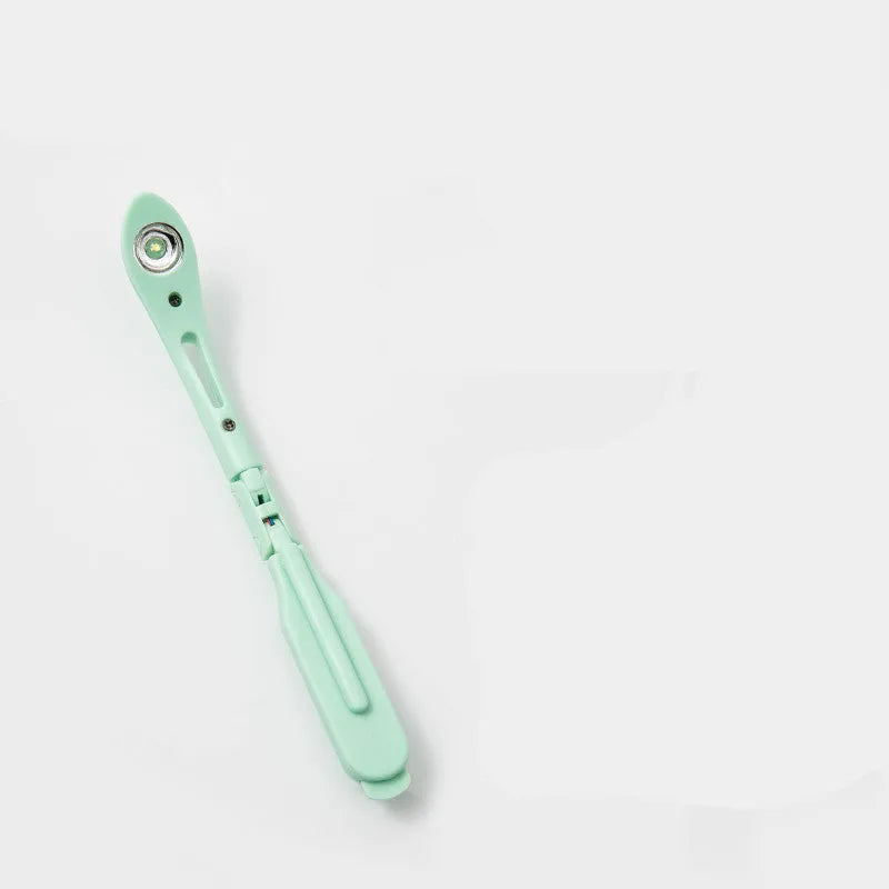 Yellow foldable USB rechargeable book light showing reading and night light modes