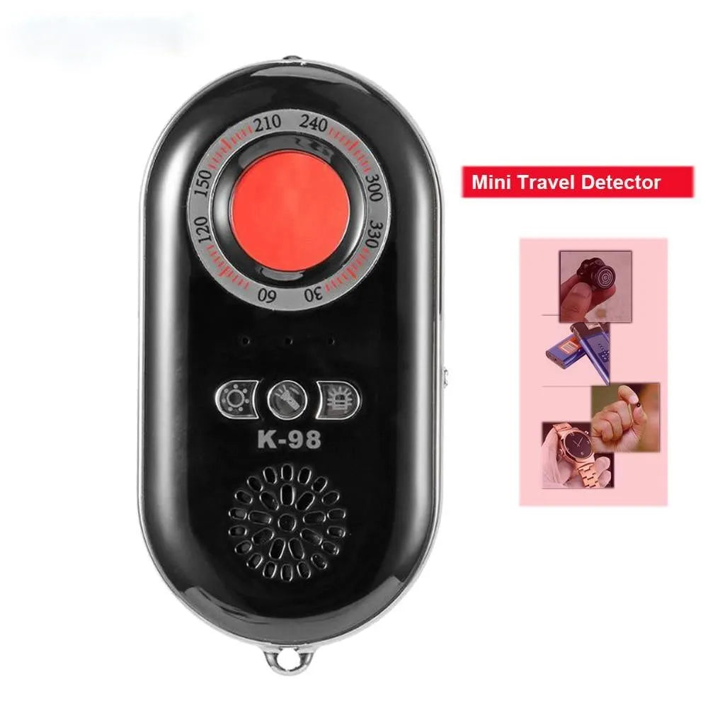 Black wireless signal detector anti-theft alarm showing compact size next to a ruler.