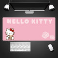 Oversized 50x100cm waterproof cloth mouse pad with cute cartoon girl design in pink on a desk