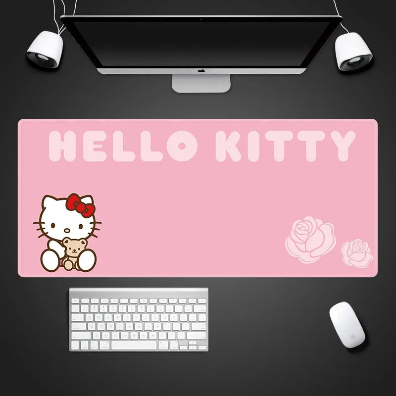 Oversized 50x100cm waterproof cloth mouse pad with cute cartoon girl design in pink on a desk