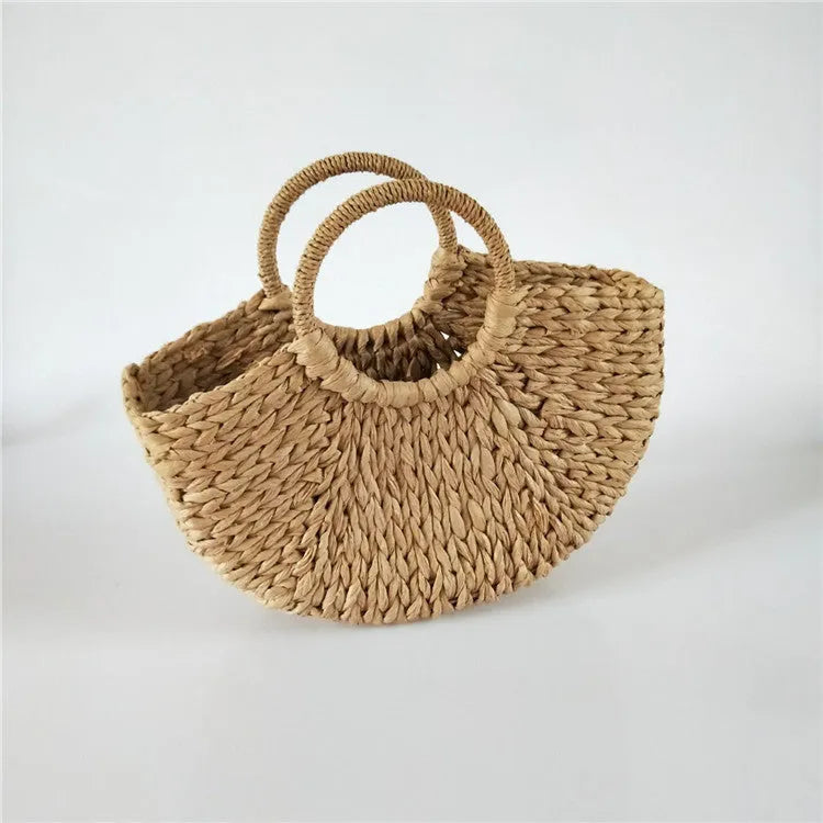 Women's rattan woven half-round handbag with open top, natural straw texture, large capacity