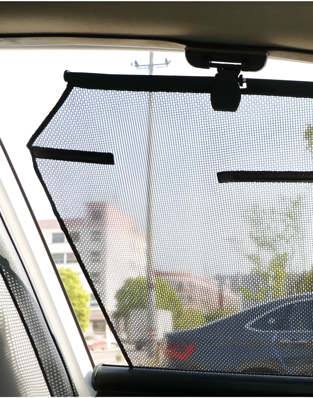 Auto retractable transparent polyester fibre sunshade curtain installed on car window, lifting with glass