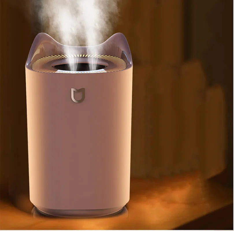 USB-powered humidifier with three mist outlets and 2.6-4.0 litre tank in Coral Pink colour