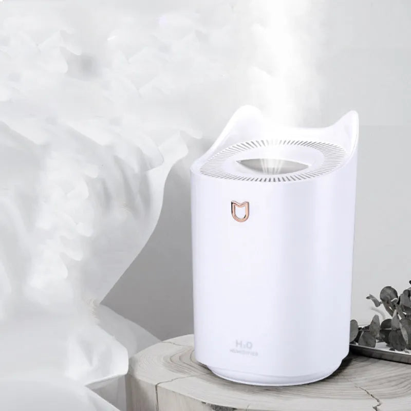 USB-powered humidifier with three mist outlets and 2.6-4.0 litre tank in Coral Pink colour
