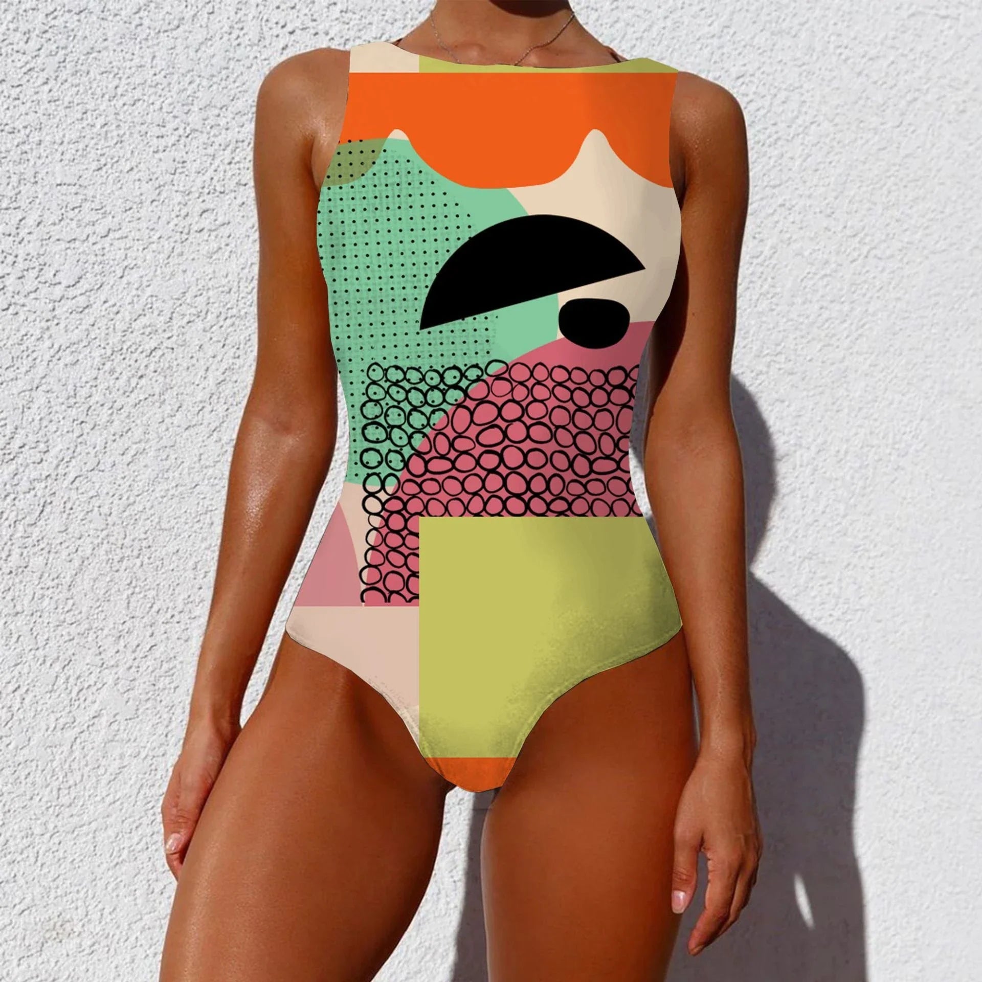 Stylish one-piece swimsuit with vibrant, abstract prints inspired by the natural beauty of Aotearoa