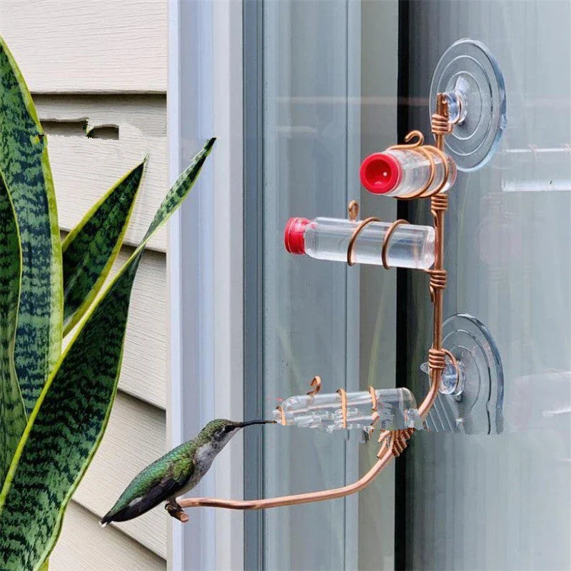 Handcrafted copper wire hummingbird feeder with transparent PET bottles for easy nectar monitoring, perfect for Kiwi gardens