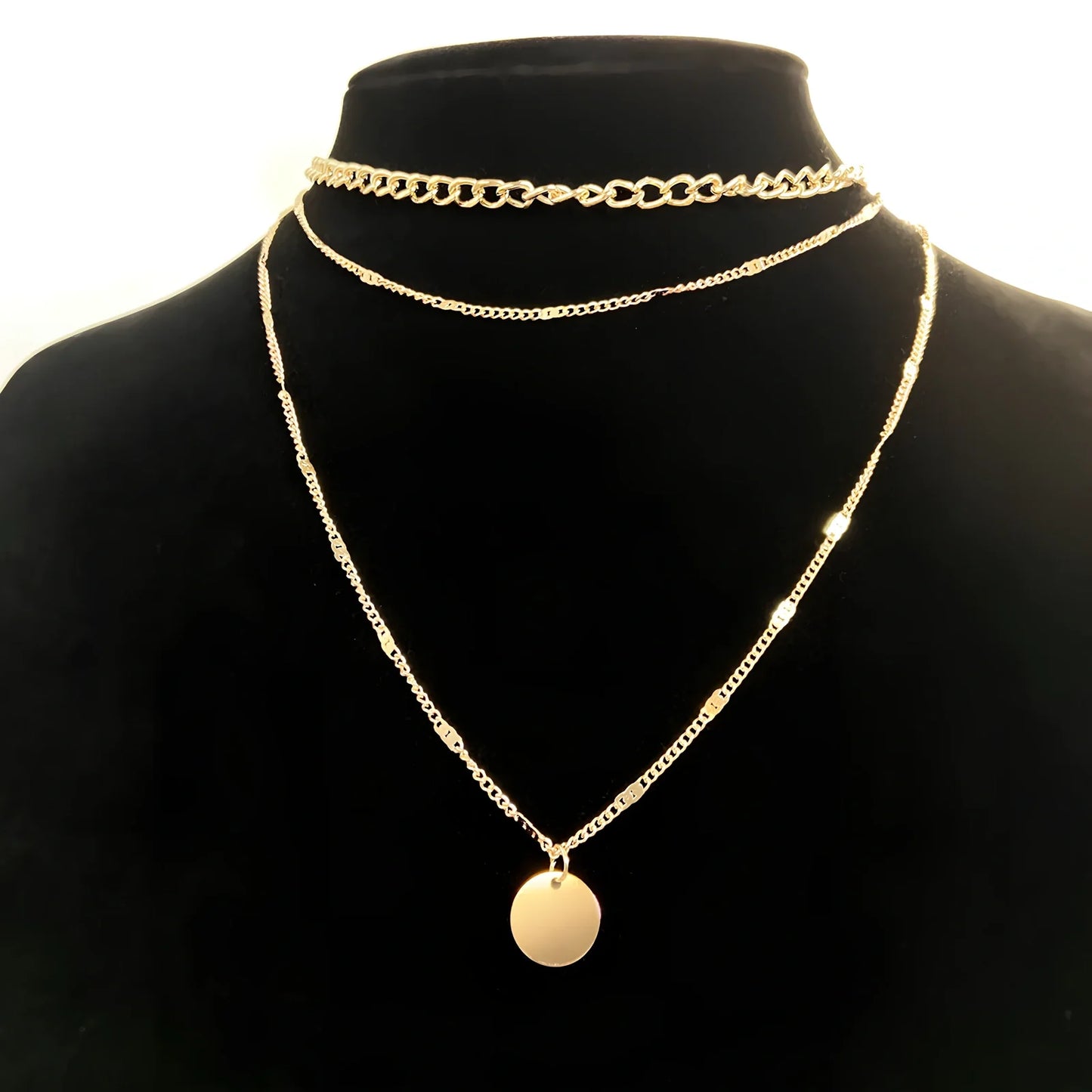 Women's multilayer alloy necklace with 2.5 cm disc pendant on 40-50 cm electroplated chains in gold or silver