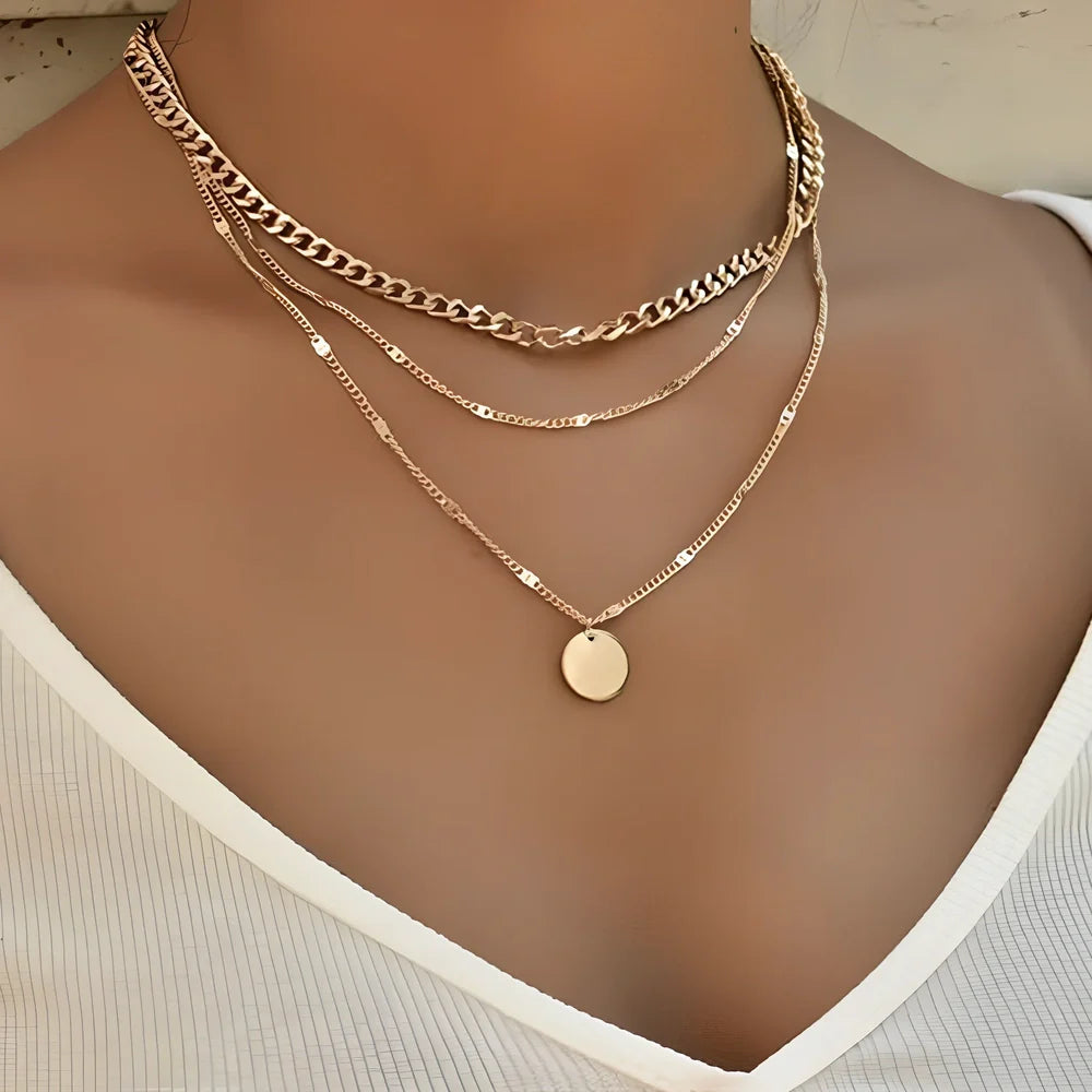Women's multilayer alloy necklace with 2.5 cm disc pendant on 40-50 cm electroplated chains in gold or silver