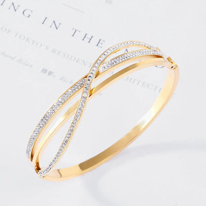 Geometric diamond-studded titanium steel bracelet with real gold plating