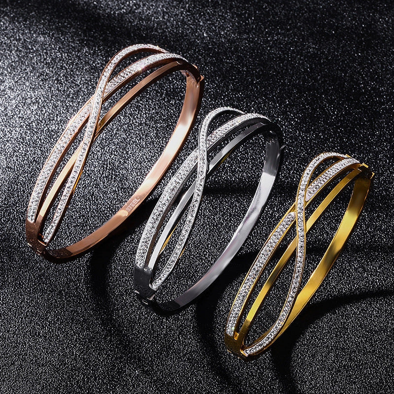 Geometric diamond-studded titanium steel bracelet with real gold plating