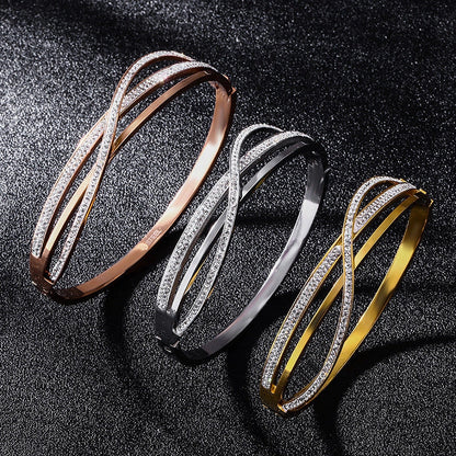 Geometric diamond-studded titanium steel bracelet with real gold plating