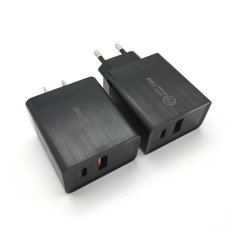Black 18W USB-C Power Delivery fast wall charger with US plug on a white background.