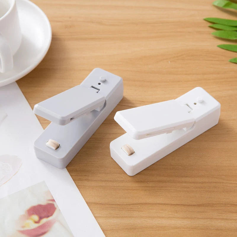 Portable ABS mini snack packaging bag heat sealing machine in white grey