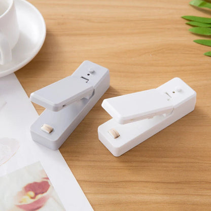 Portable ABS mini snack packaging bag heat sealing machine in white grey