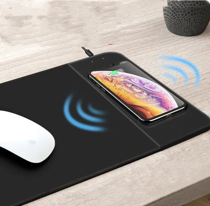 Colourful cartoon wireless charging mouse pad with RGB lighting showing 298mm length