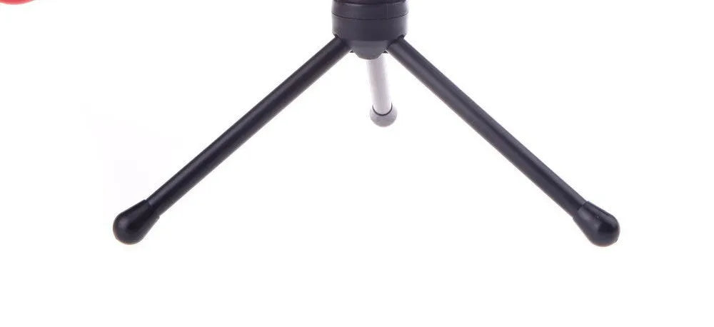 Black wired mini microphone with clip holder and separate desk stand on a white background.