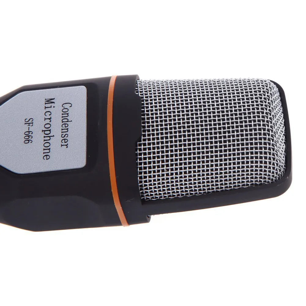 Black wired mini microphone with clip holder and separate desk stand on a white background.