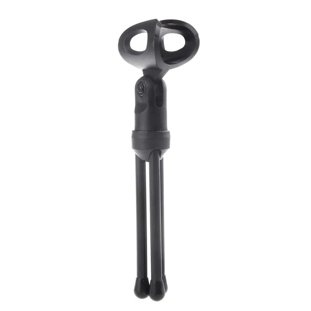 Black wired mini microphone with clip holder and separate desk stand on a white background.