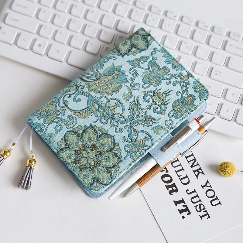 Flying Blue Flower fabric notebook in A5 and A6 sizes with blue floral print cover.