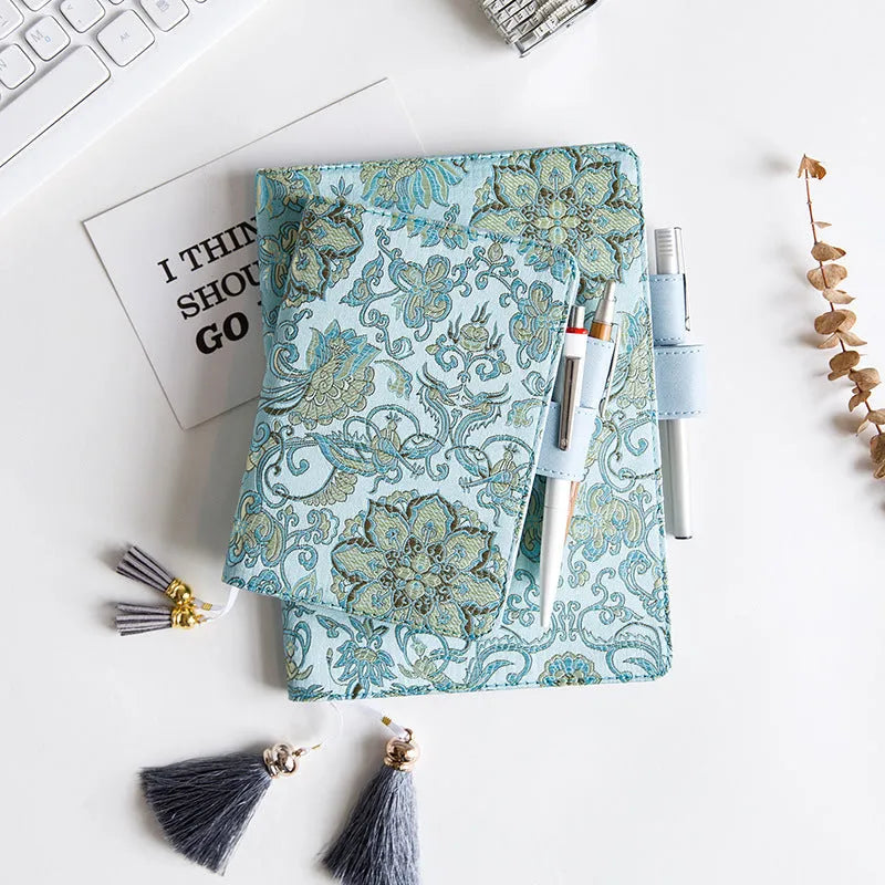 Flying Blue Flower fabric notebook in A5 and A6 sizes with blue floral print cover.