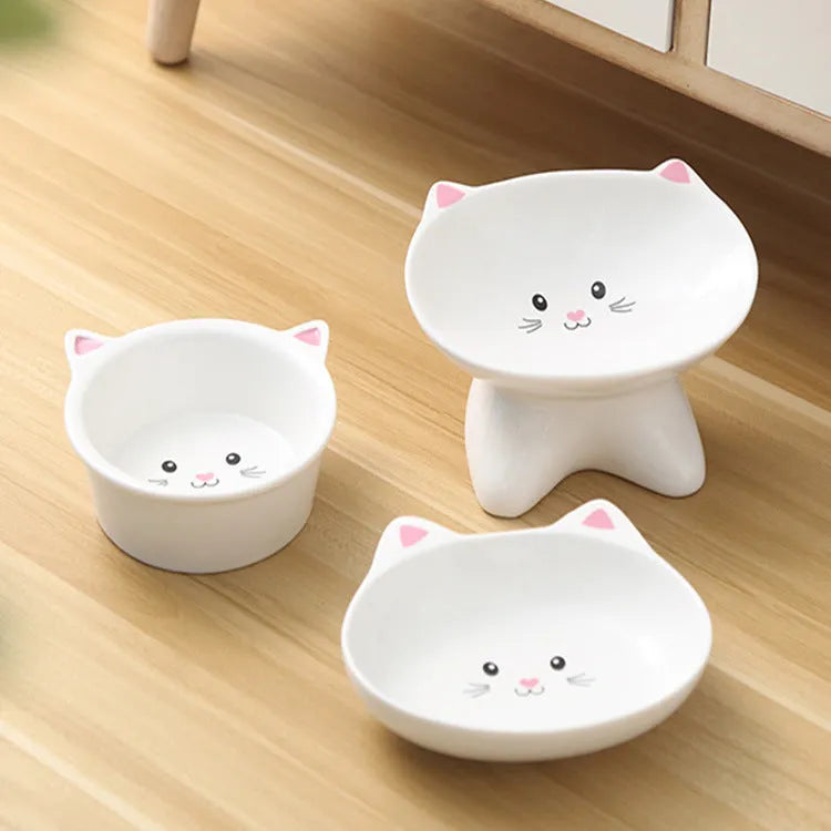 Ceramic small cat face shape pet food bowl in black, porcelain material, with non-slip base