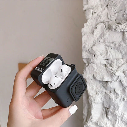 Black silicone AirPods case with flip-top design and carabiner hook attachment