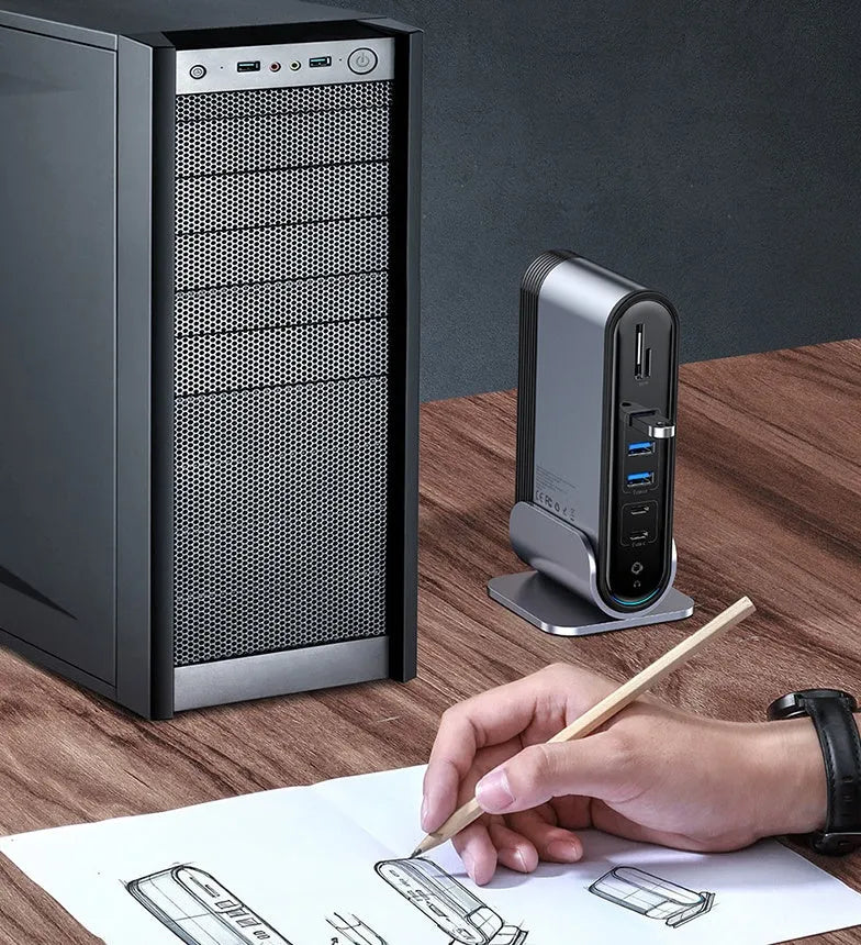 Deep space grey 16-in-1 USB-C docking station with multiple ports and an external power supply.