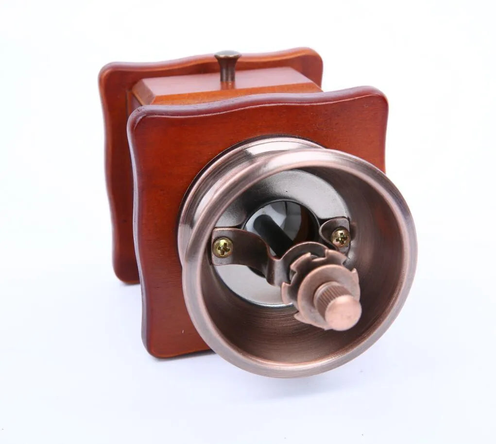 Red hand grinder coffee grinder with ceramic burr, pine wood body and cast iron hardware, 10x10x17cm