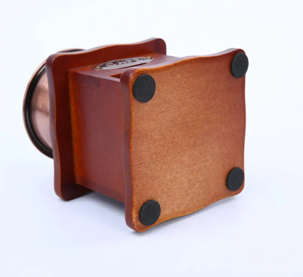 Red hand grinder coffee grinder with ceramic burr, pine wood body and cast iron hardware, 10x10x17cm