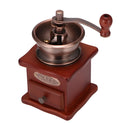 Red hand grinder coffee grinder with ceramic burr, pine wood body and cast iron hardware, 10x10x17cm