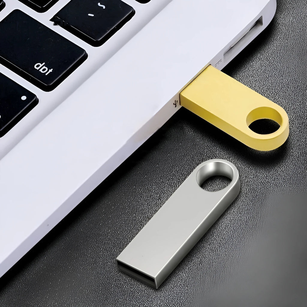 USB 2.0 flash drive with metal casing in gold and silver, compact size, and 128GB capacity for laptop use.